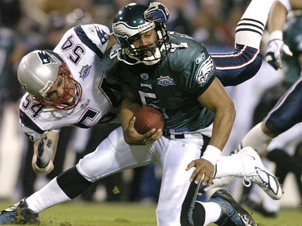 Tedy Bruschi brings down Donovan McNabb in Super Bowl XXXIX. Ultimately, Andy Reid's poor clock management brought down the Eagles' chances of a comeback.