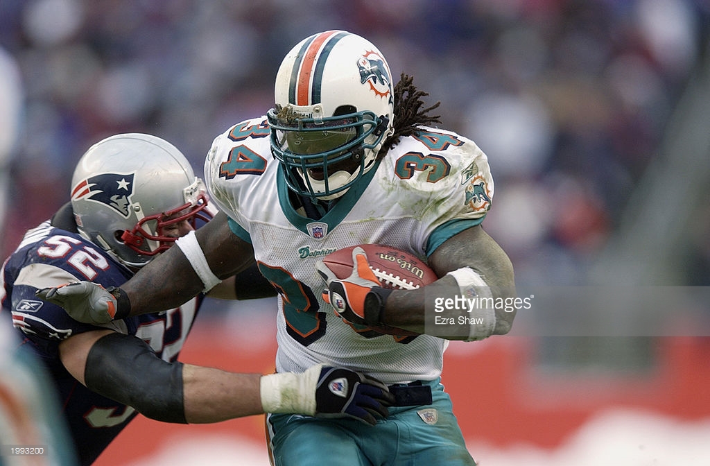 Ricky Williams had his way with the Patriots defense in the 2002 finale, but head coach Dave Wannstedt failed to call his number in the game's critical moments, leading to a Patriots comeback win in overtime.